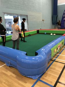 Group of Adults playing the Football Pool