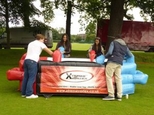 4 Players playing air football outside