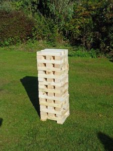 Giant jenga garden game consisting of wooden blocks to make a giant tower.