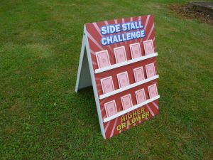 Traditional side stall game, higher or lower set up for an event.