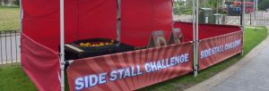 Hook A Duck game set up in a gazebo for a side stall challenge event.