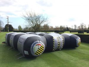 Laser Tag dome is an inflatable game which is set up on a lawn at a manor hour for a corporate team building day.