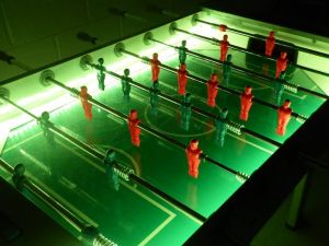 Football Table complete with LED lighting at an evening event.