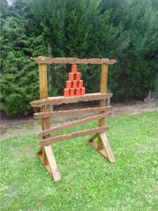 Traditional side stall game of tin can alley set up for an event.