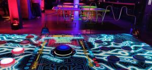 LED Neuron Race, Giant Buzz Wire and UV Table Tennis set up for an event