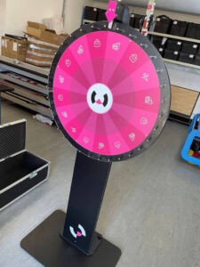 Prize wheel with black stand and branding wheel